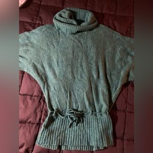 Green, three-quarter sleeve turtle/cowl neck sweater